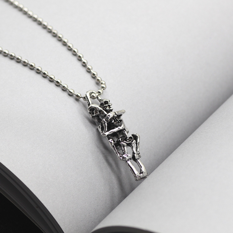 Embracing Lovers Skull Necklace